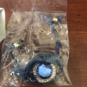 Blue string bracelet